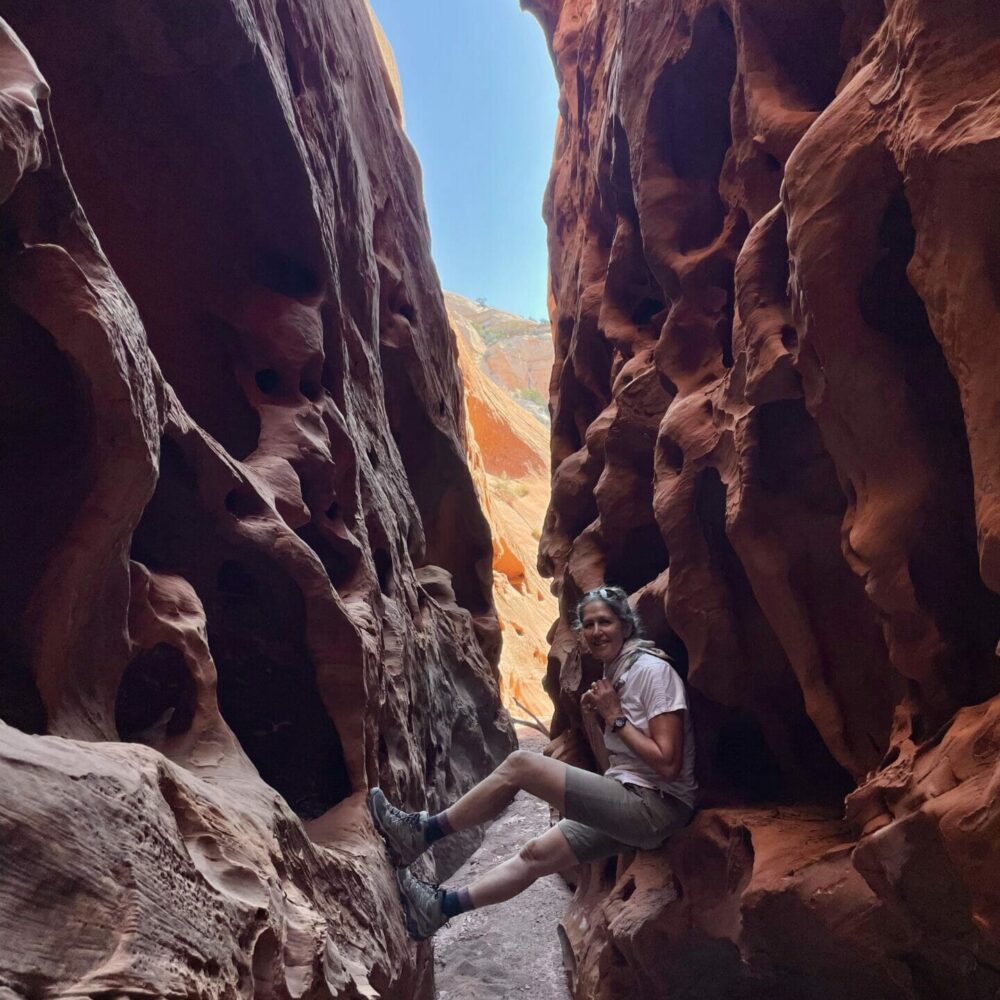 man wedged in slot canyon